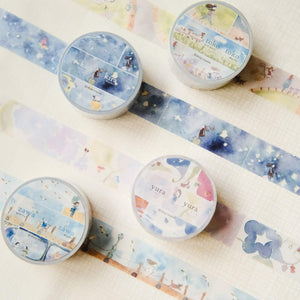 Set of washi tape rolls with cute illustrations on a light background