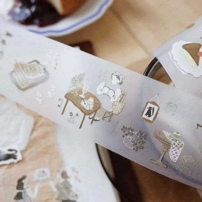 Sheet of Afternoon Tea PET Tape whimsical tea-time sticker designs laid on a white surface