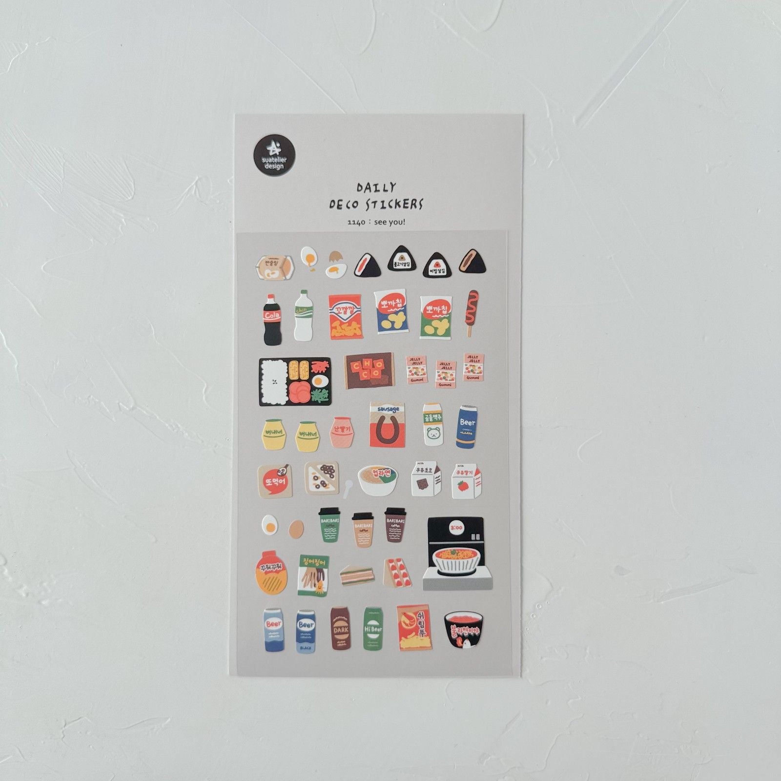 Sheet of daily deco stickers with various small illustrations on a white background