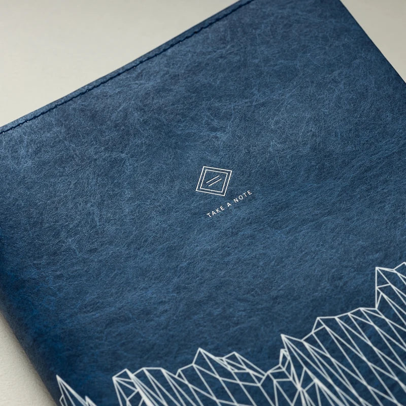Reverberation Tyvek Book Cover by Take a Note — navy Tyvek cover with mountain design and logo, for journaling
